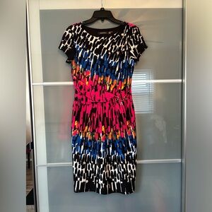 Women’s dress. Gold details.